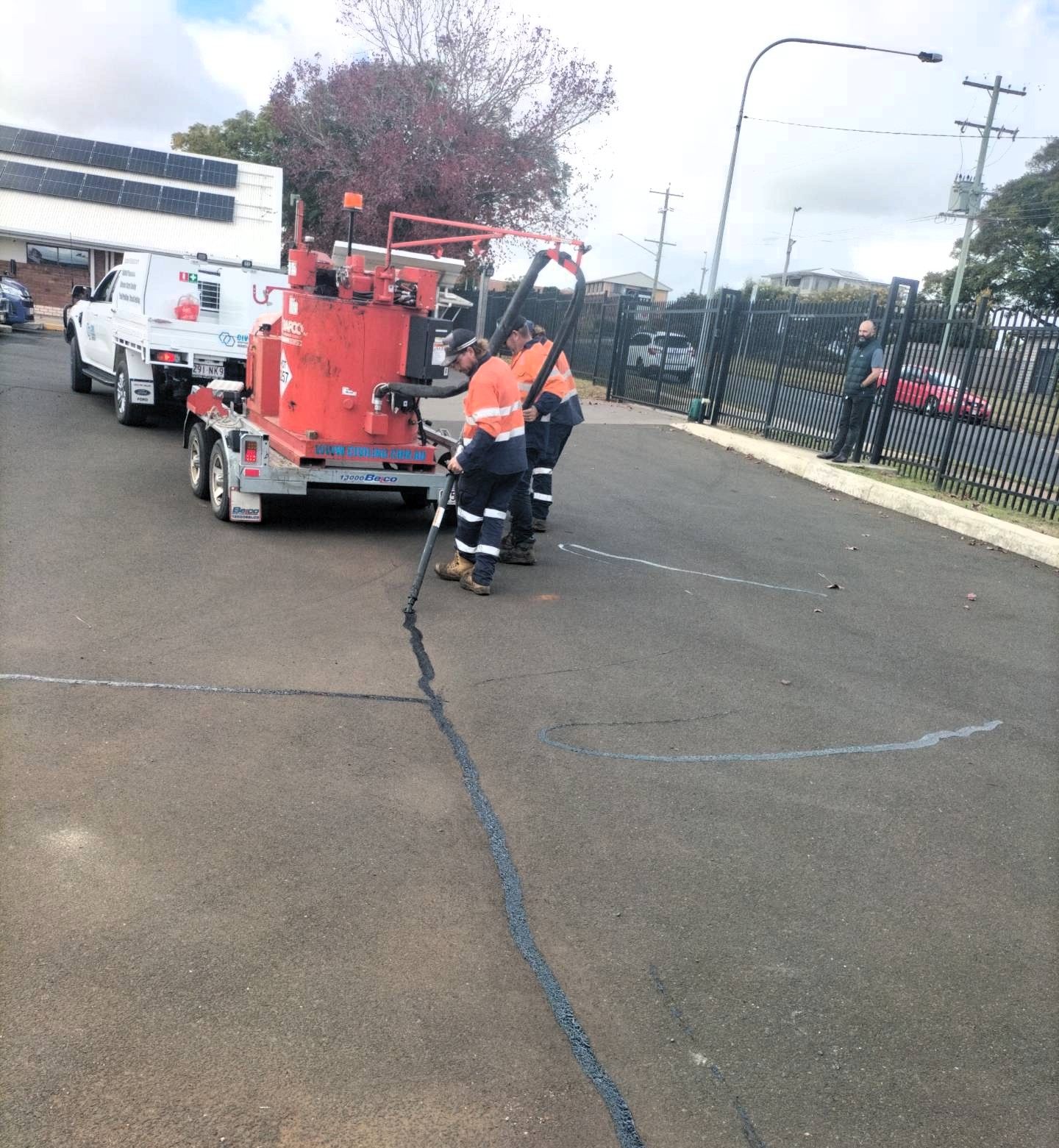 CII crack sealing unit treating pavement cracks to prevent water ingress